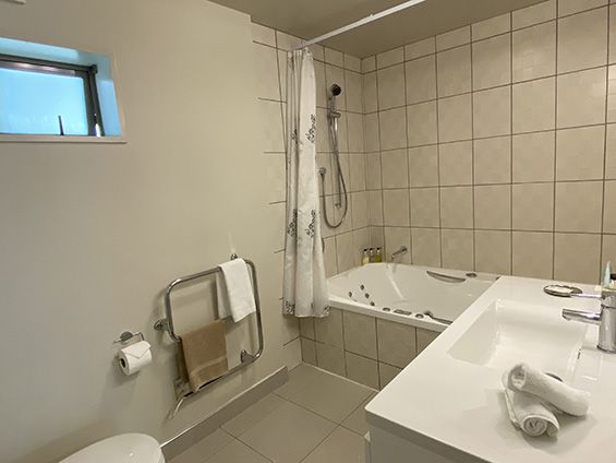 deluxe studio with spa bath bathroom